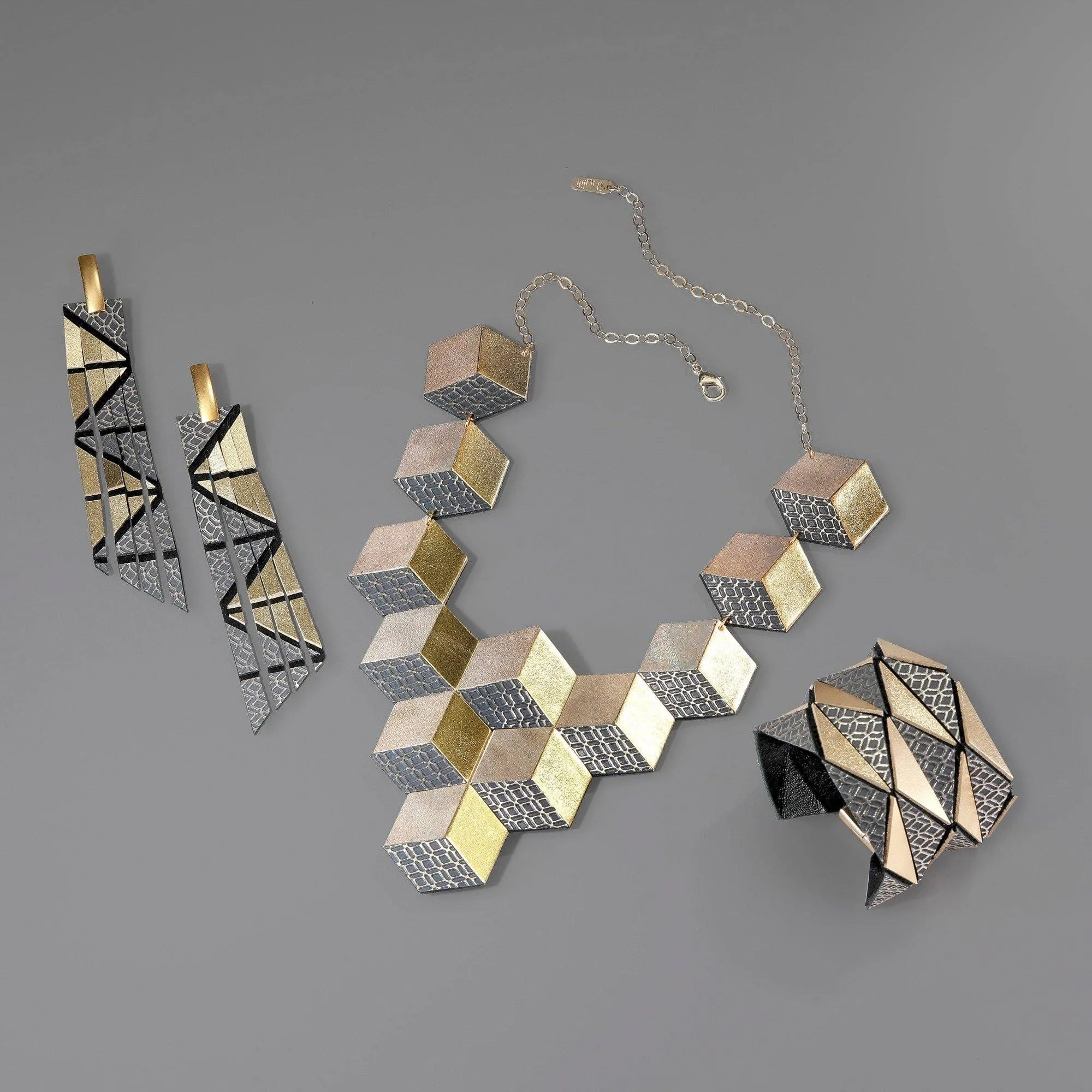 Geo gold long geometric leather earrings